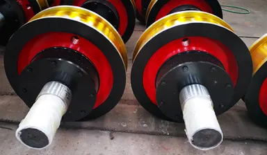 Assembled crane wheel sets with shafts and bearing housings